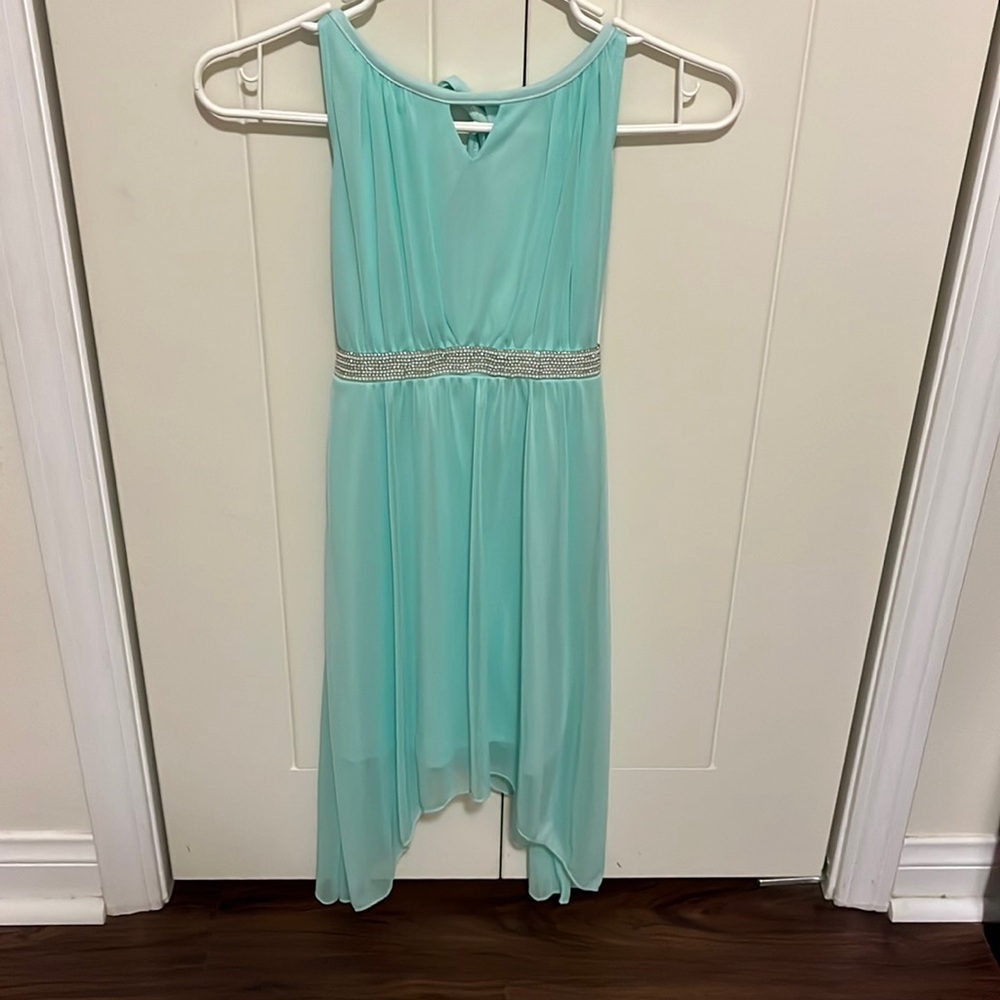 Mint colored dress with jewels at waist